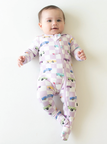 KYTE BABY ZIPPERED FOOTIE IN SPARKLES AND SPEED