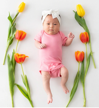 Load image into Gallery viewer, KYTE BABY BODYSUIT IN ROSE